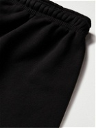 Adish - Tapered Tasselled Logo-Embroidered Cotton-Jersey Sweatpants - Black
