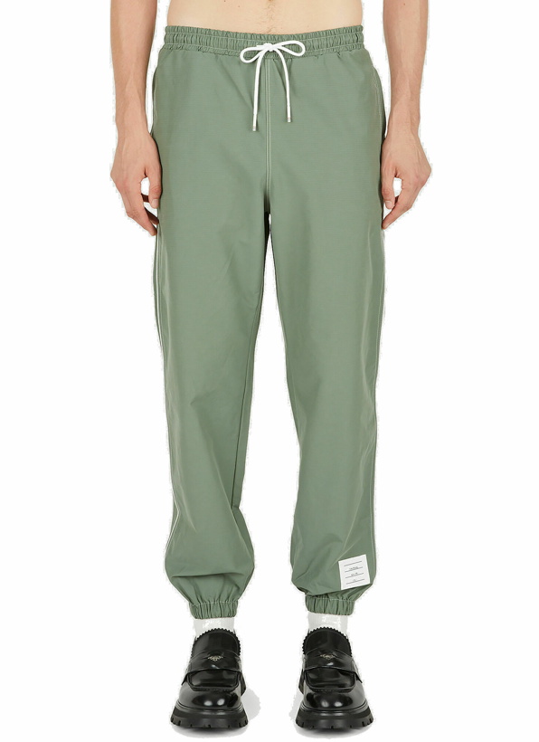 Photo: Logo Patch Track Pants in Green