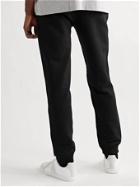 Burberry - Printed Cotton-Jersey Sweatpants - Black