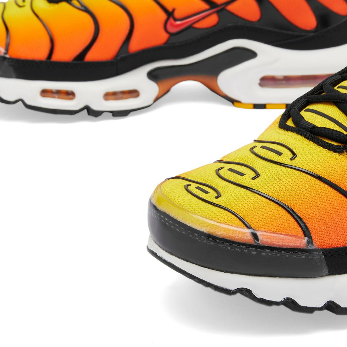 Nike Men s Air Max Plus Sunset Sneaker in Black Resin White