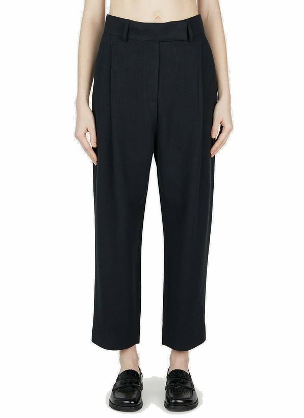 Photo: TOTEME - Pleated Pants in Black