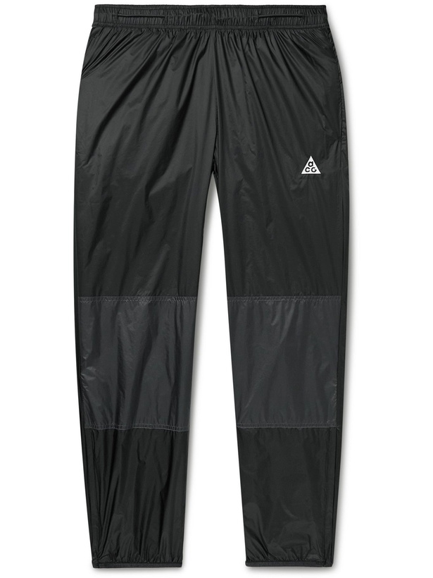 Photo: NIKE - NRG ACG Cinder Cone Tapered Recycled Nylon Track Pants - Black