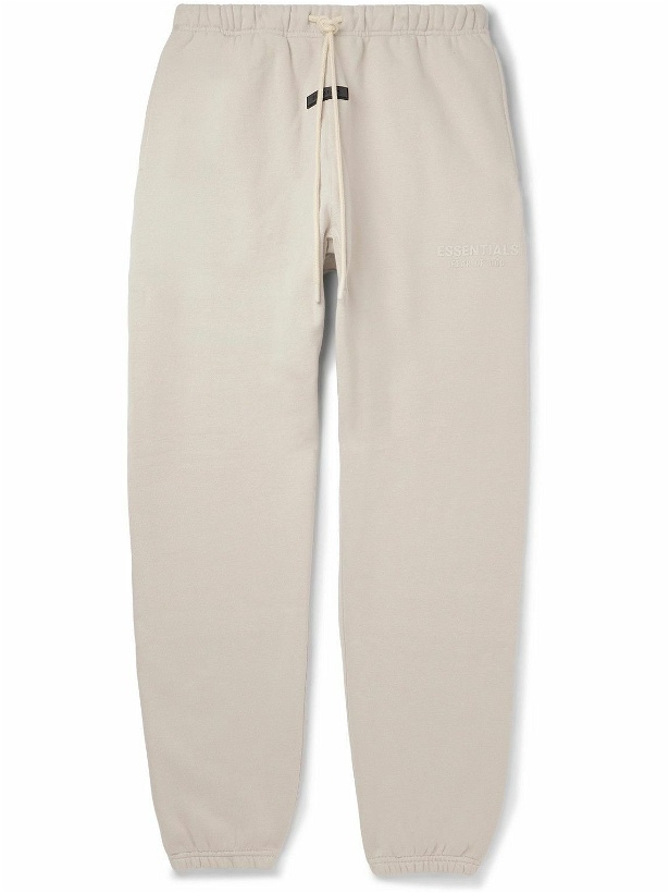 Photo: FEAR OF GOD ESSENTIALS - Tapered Logo-Appliquéd Cotton-Blend Jersey Sweatpants - Gray