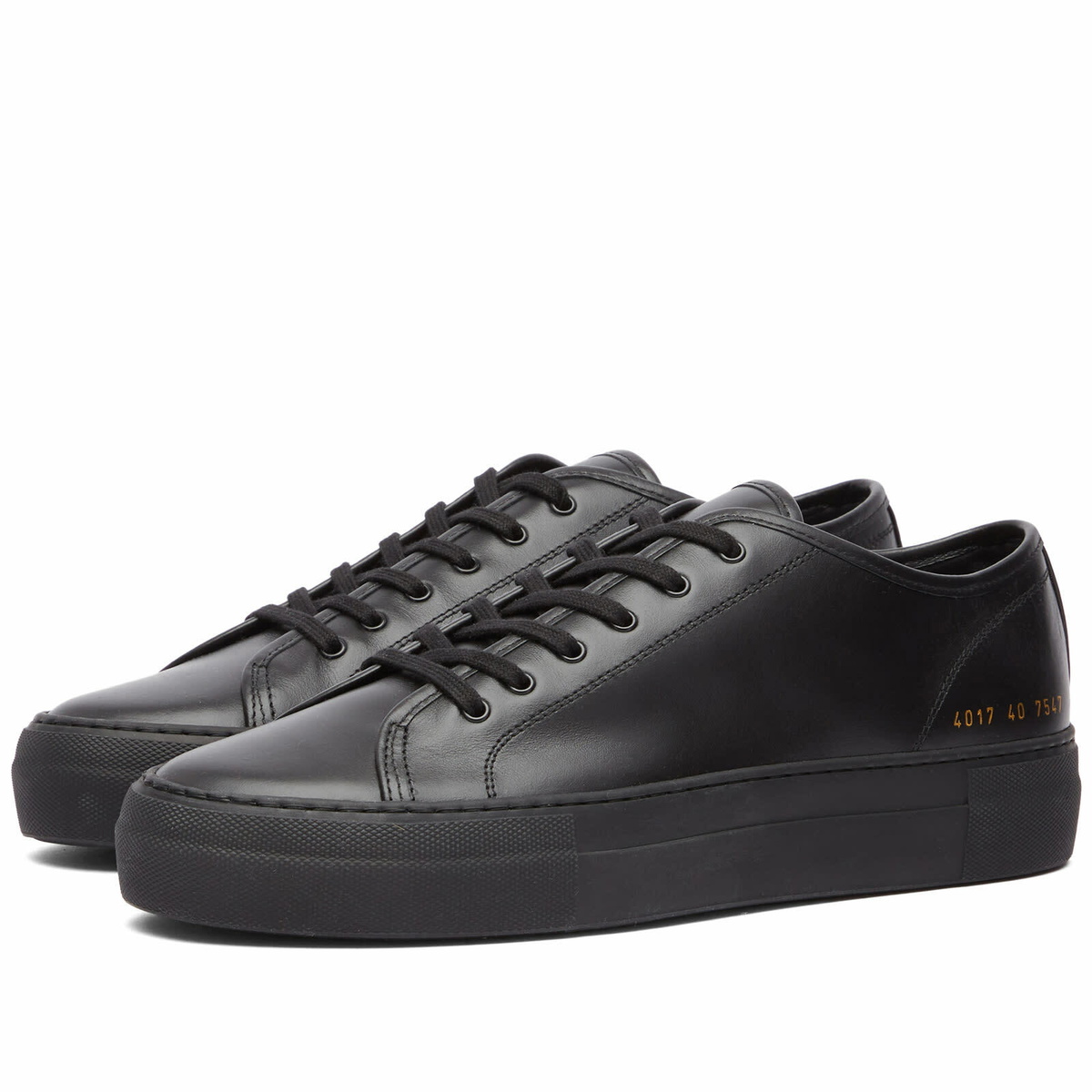 Woman by Common Projects Women s Super Tournament Low Trainers Sneakers in Black Woman by Common Projects