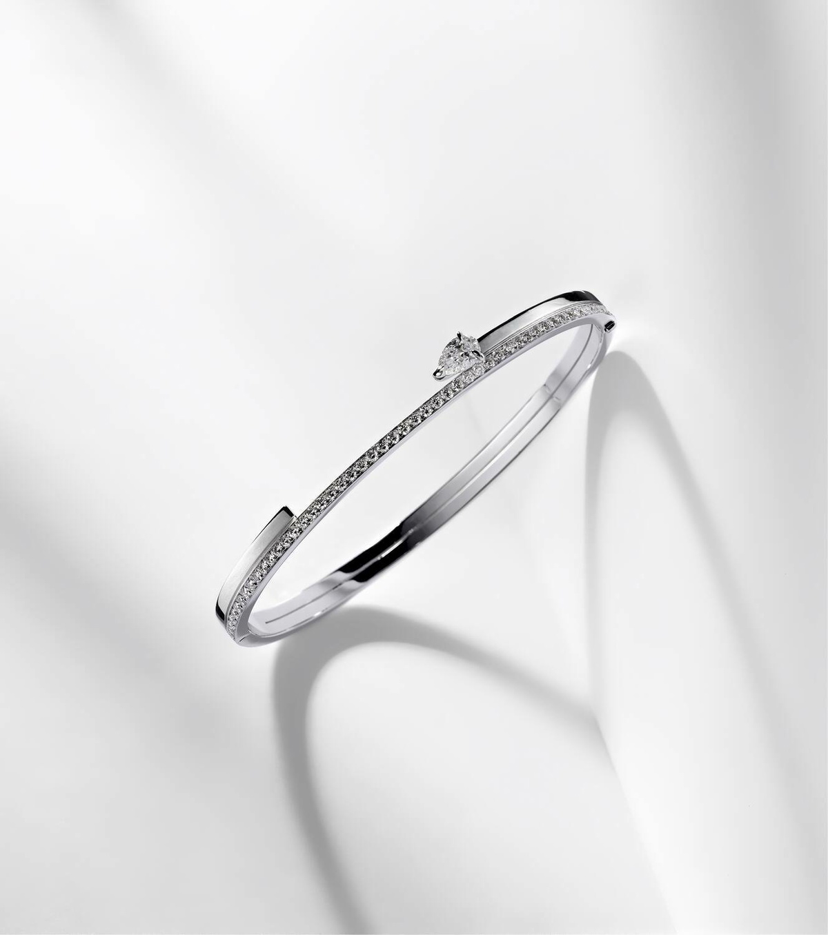 Repossi Serti Sur Vide 18kt white gold bangle with diamonds