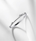 Repossi Serti Sur Vide 18kt white gold bangle with diamonds