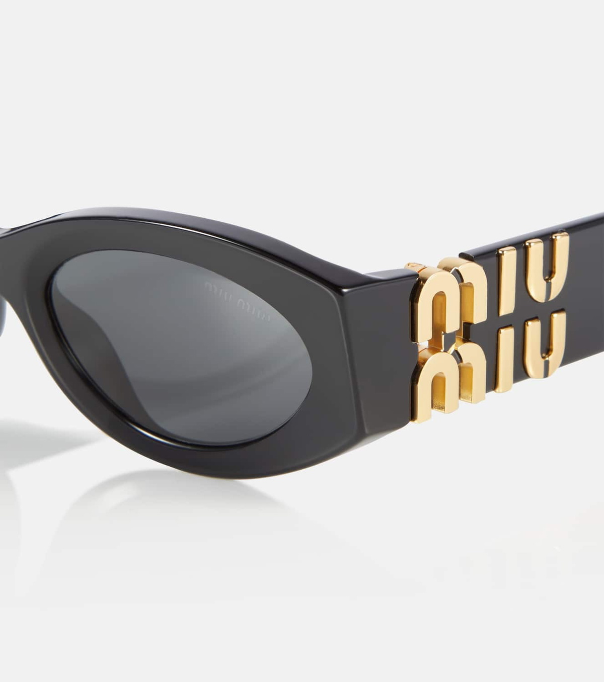 Miu Miu Oval sunglasses Miu Miu