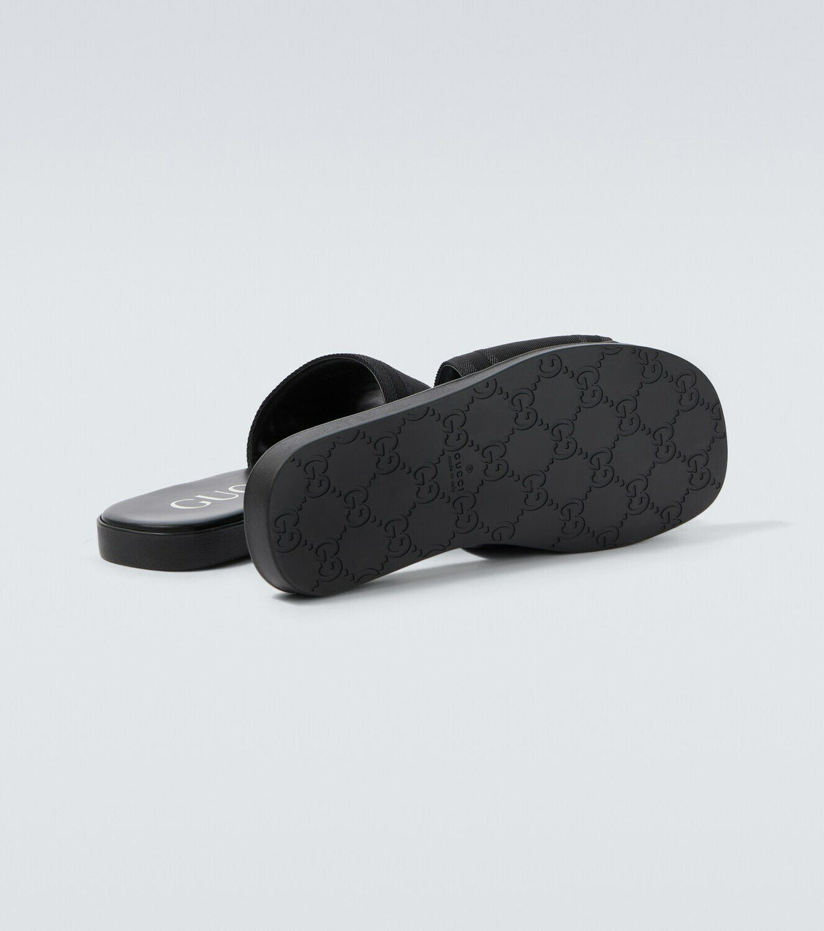 Gucci Logo canvas and leather slides