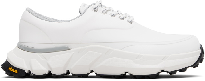 Photo: Comme des Garçons Homme White Synthetic Leather Low Top Sneakers