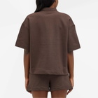 New Balance Women's Linear Heritage French Terry Collared Shirt in Black Coffee