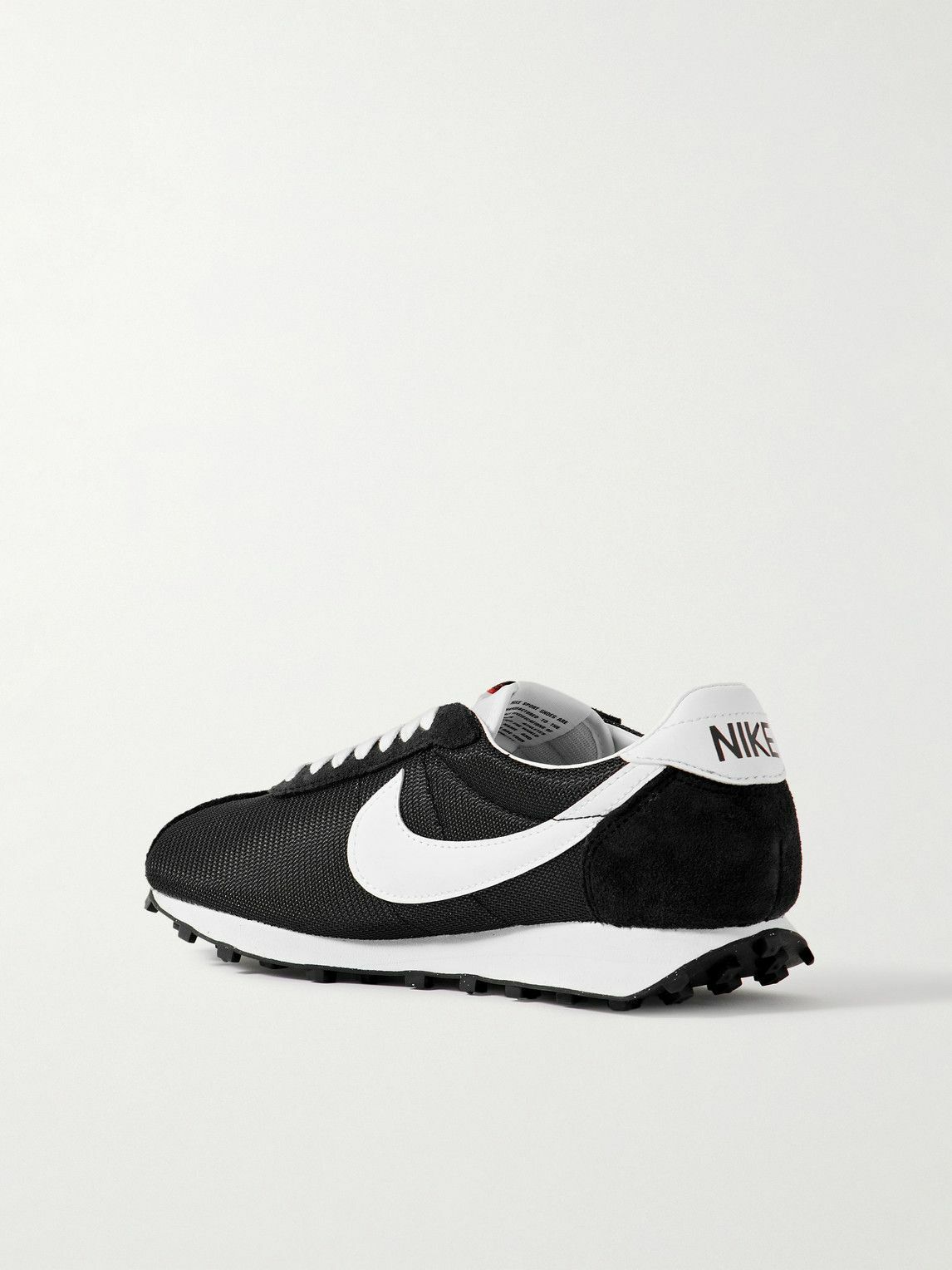 nike cortez black and white suede