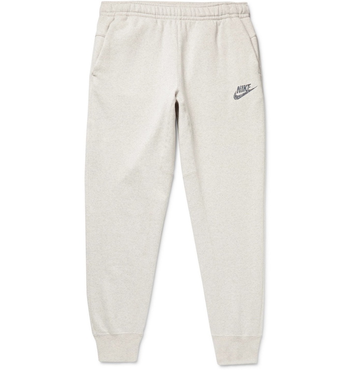 Photo: Nike - Sportswear Tapered Logo-Print Mélange Fleece-Back Cotton-Blend Jersey Sweatpants - Neutrals