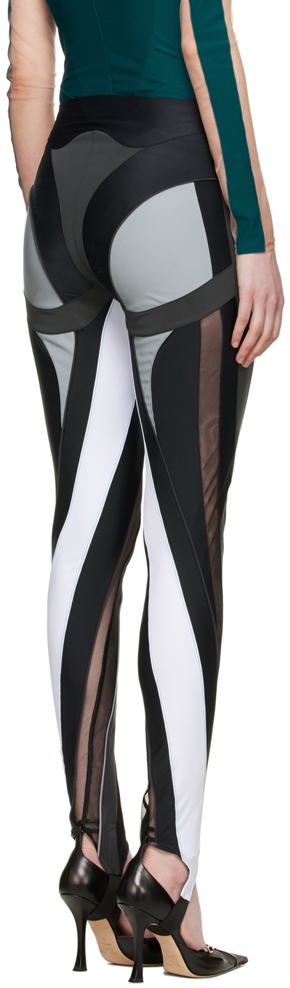 https://cdn.clothbase.com/uploads/32709557-5cb7-4d36-addf-af58177203c0/black-and-grey-nylon-leggings.jpg