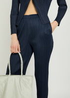 Pleats Please Issey Miyake Pleated Tapered-leg Woven Trousers Navy