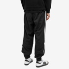 Adidas Men's Woven Firebird Track Pant in Black