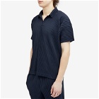 Homme Plissé Issey Miyake Men's Pleated Polo Shirt in Navy