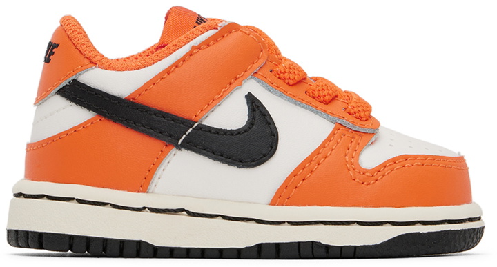 Photo: Nike Baby Orange & White Dunk Low Sneakers