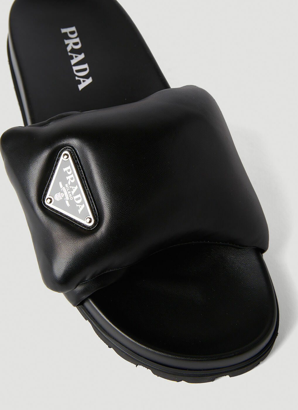 Prada Padded Logo Plaque Slides in Black Prada