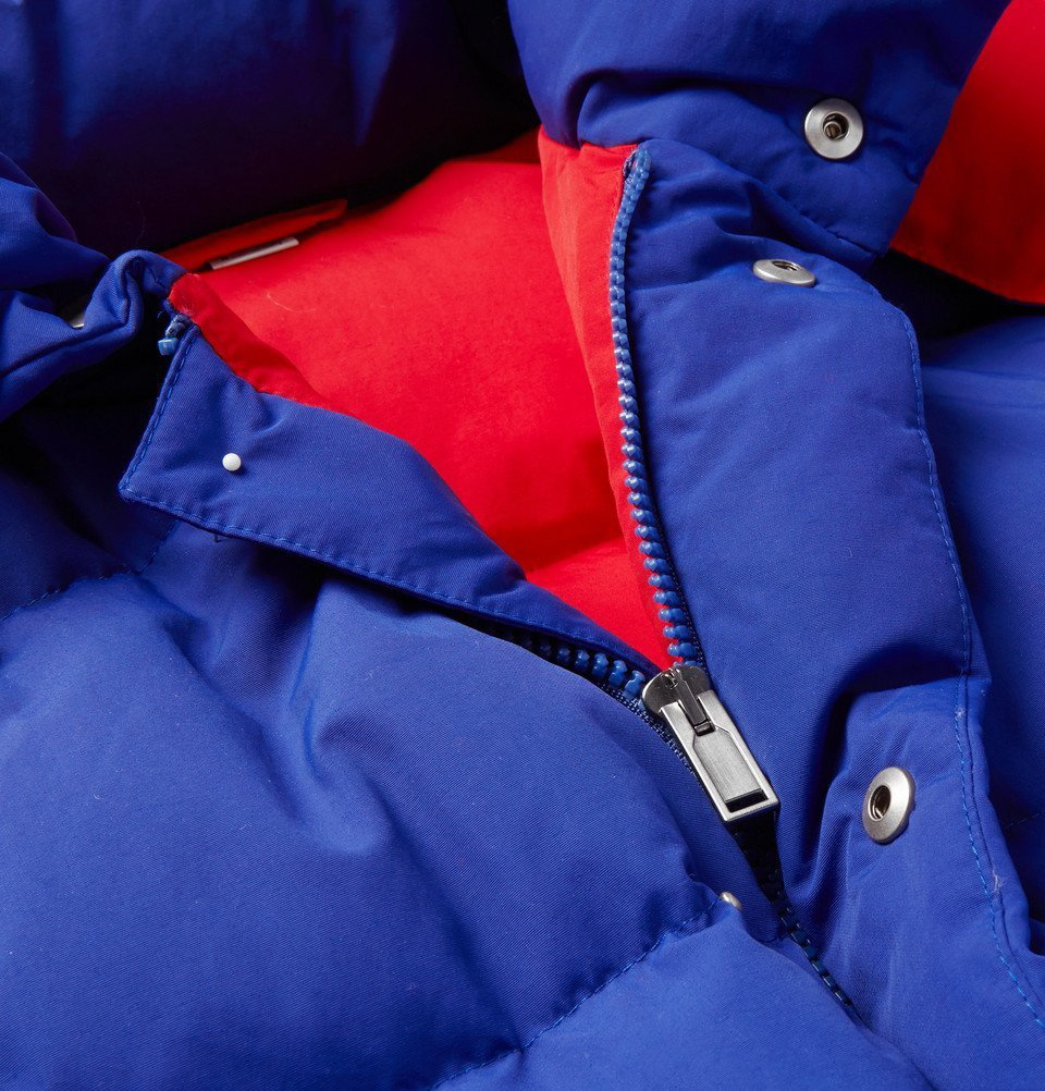 GUCCI Down jacket with detachable sleeves in red/ blue