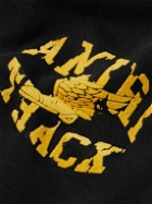 AMIRI - Wide-Leg Logo-Flocked Cotton-Jersey Sweatpants - Black