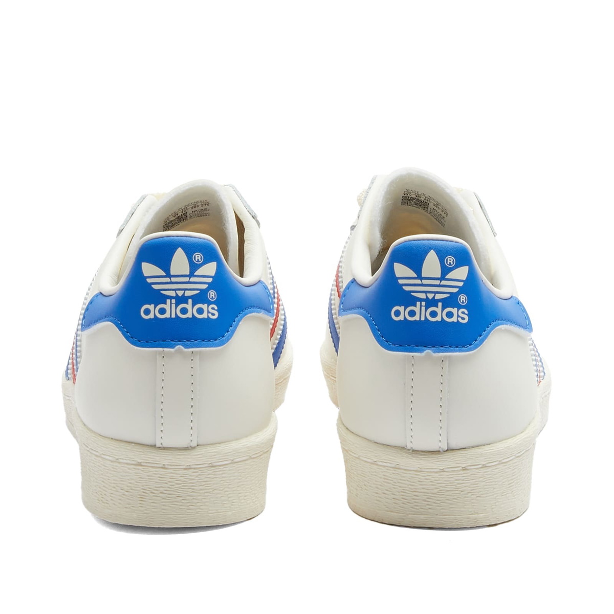 Adidas superstar white hot sale with blue stripes