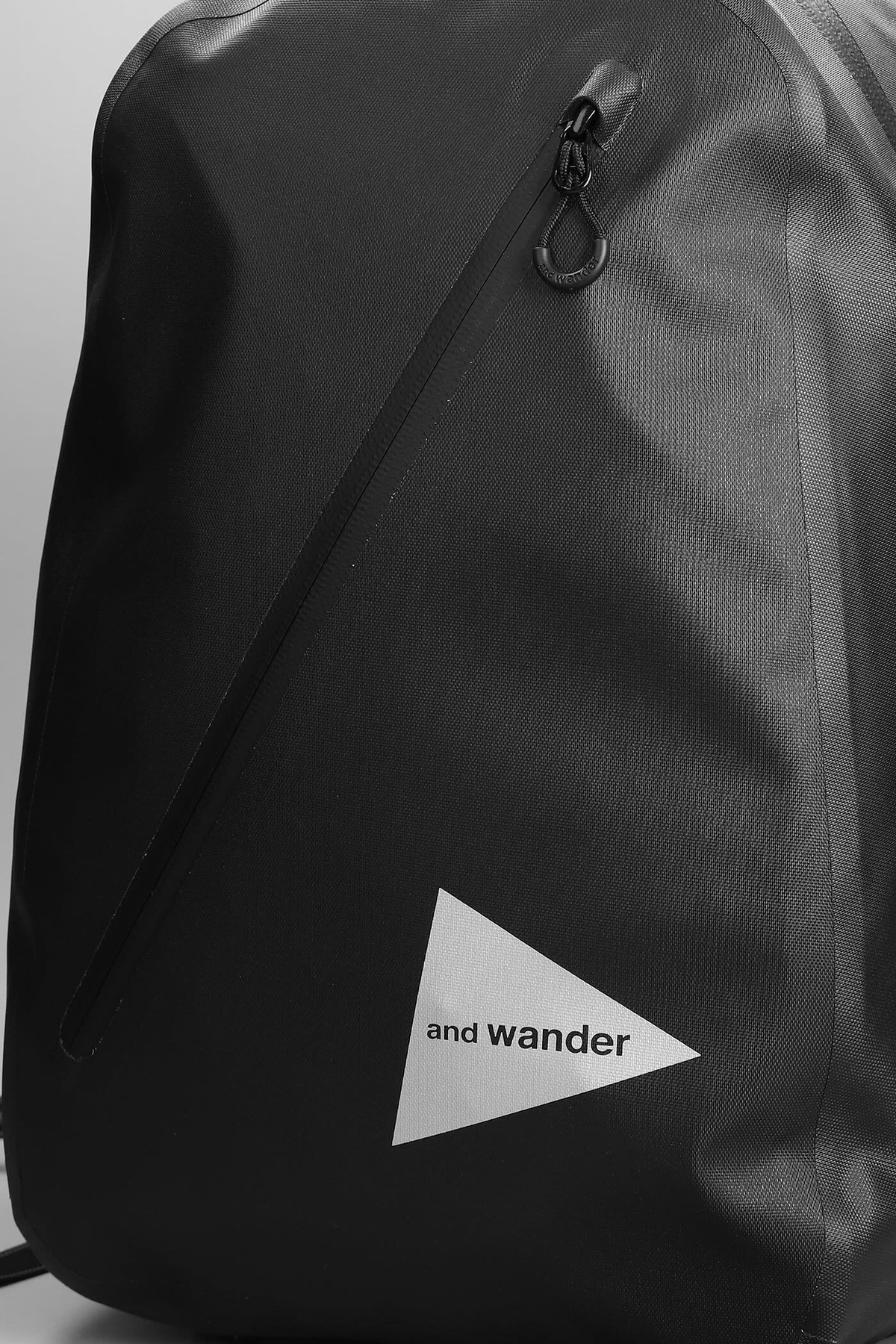 And Wander Backpack In Black Nylon and Wander
