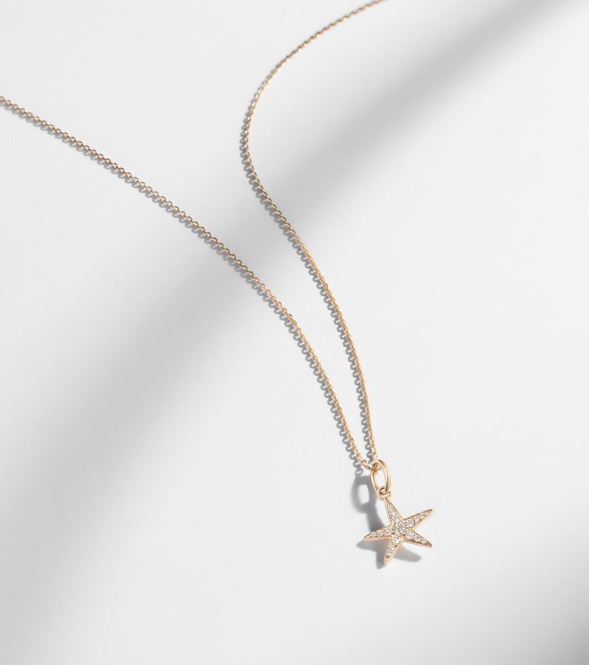 Stone and Strand Lucky Starfish 14kt gold pendant necklace with diamonds