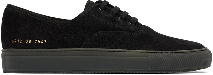 Photo: Common Projects Black Four Hole Sneakers