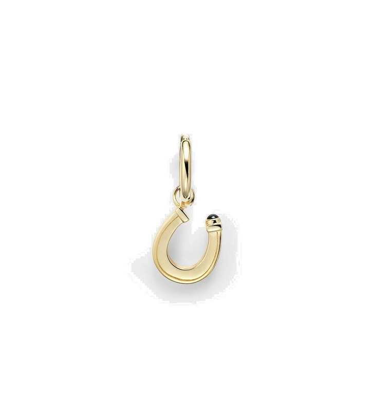 Photo: Marie Lichtenberg Baby Charm Horseshoe 18kt gold single earring with sapphire