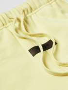 FEAR OF GOD ESSENTIALS - Tapered Logo-Flocked Cotton-Blend Jersey Sweatpants - Yellow