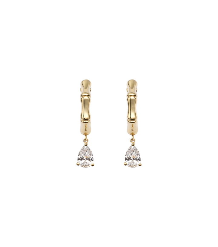 Photo: Anita Ko Bamboo Small 18kt gold huggie earrings with diamonds