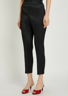 Pleats Please Issey Miyake Pleated Tapered-leg Woven Trousers Black