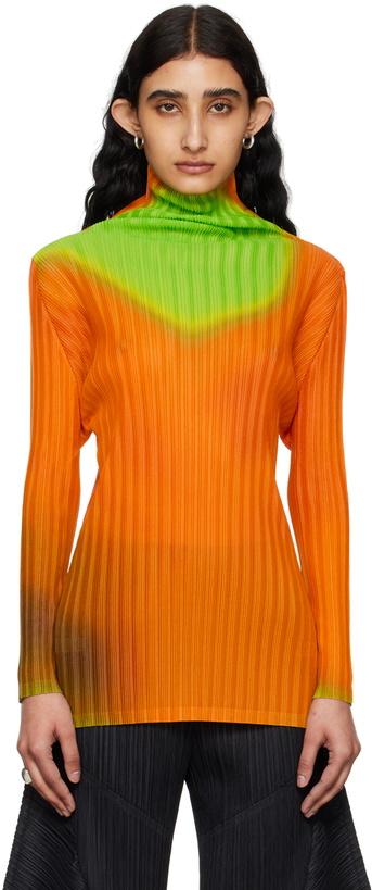 Photo: PLEATS PLEASE ISSEY MIYAKE Orange Melty Rib Turtleneck