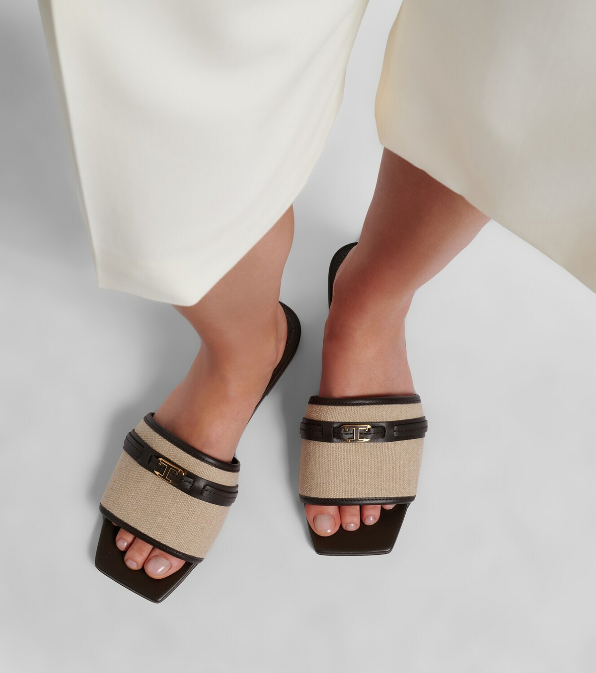 Tod's Leather-trimmed raffia slides