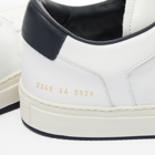 Common Projects Men's Decades Low Sneakers in White/Navy