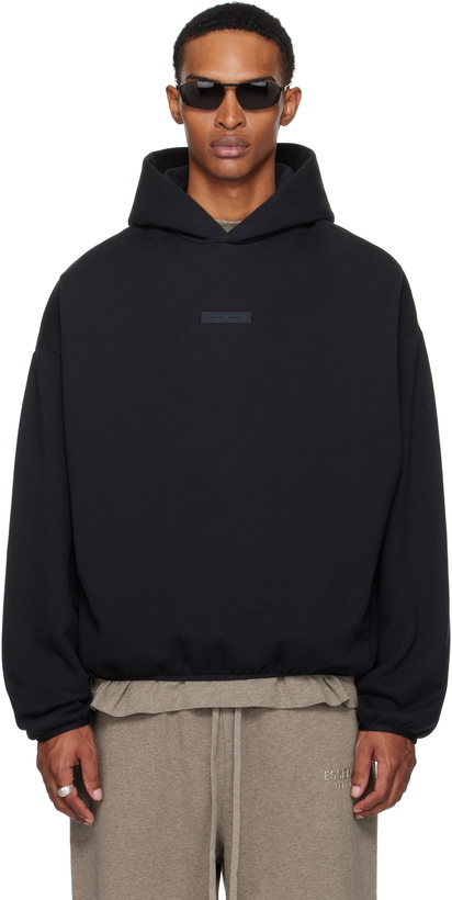Photo: Fear of God ESSENTIALS Black Modern Fit Fleece Hoodie