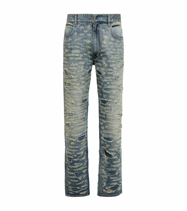 Photo: Givenchy - Distressed embellished slim jeans