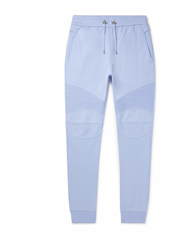 Photo: Balmain - Slim-Fit Panelled Logo-Appliquéd Cotton-Jersey Sweatpants - Blue