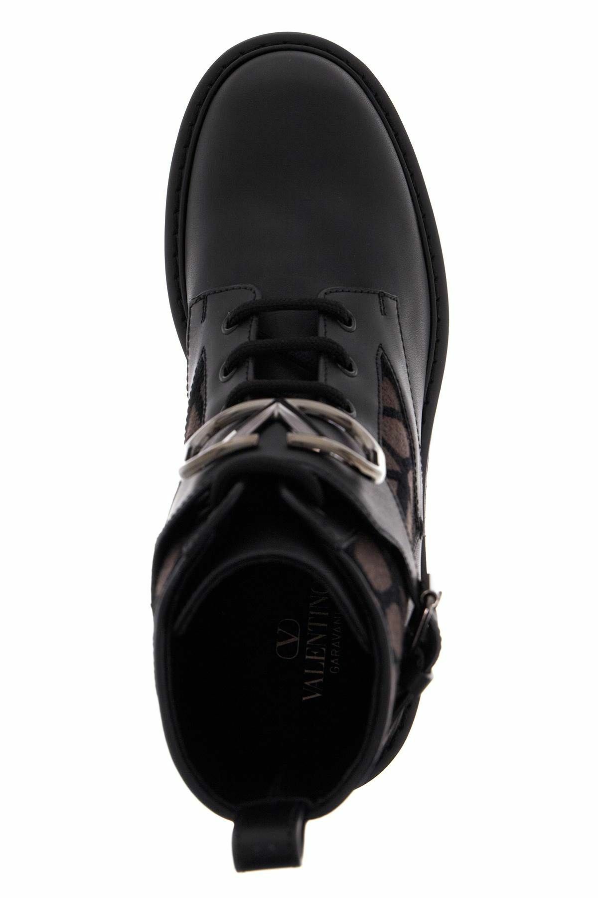 VALENTINO GARAVANI 'leather and canvas iconographer an Black
