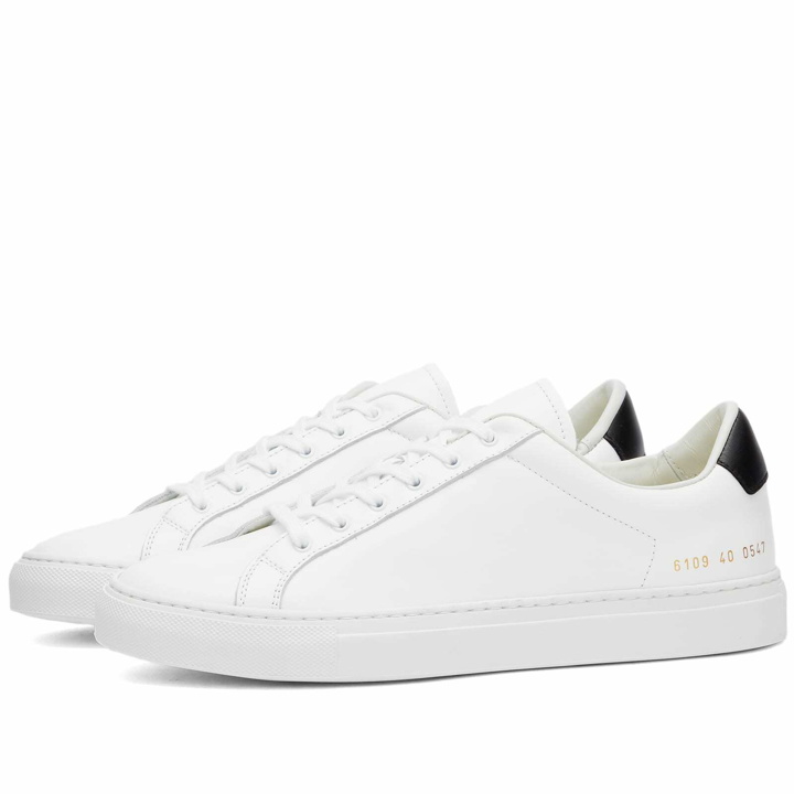 Photo: Woman by Common Projects Women's Retro Low Sneakers in White/Black