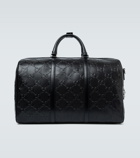 Gucci - GG embossed leather duffel bag