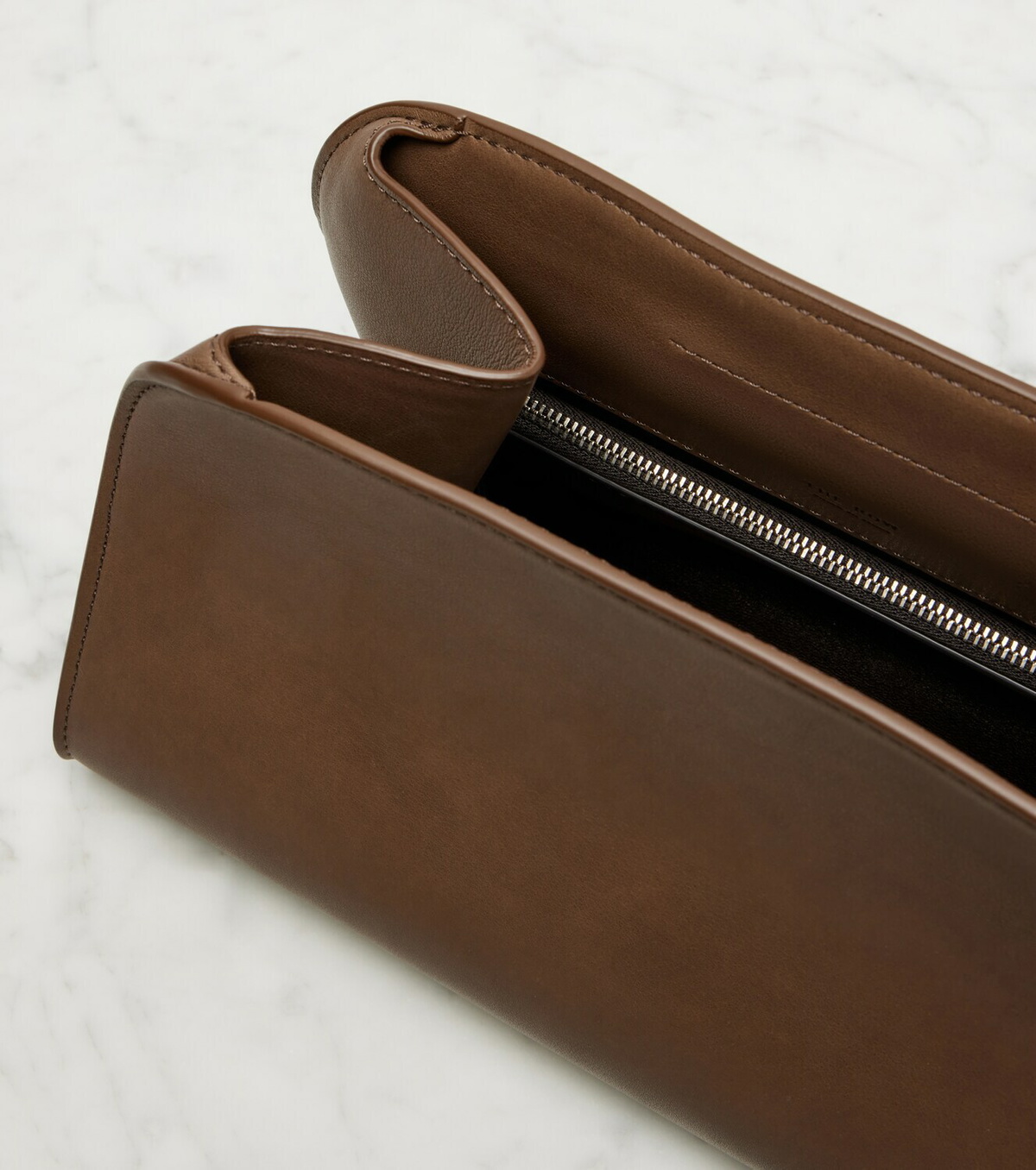 The Row Peggy Small leather clutch