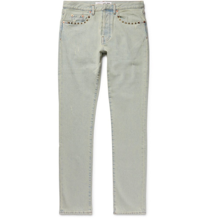 Photo: Valentino - Slim-Fit Studded Distressed Denim Jeans - Men - Light denim