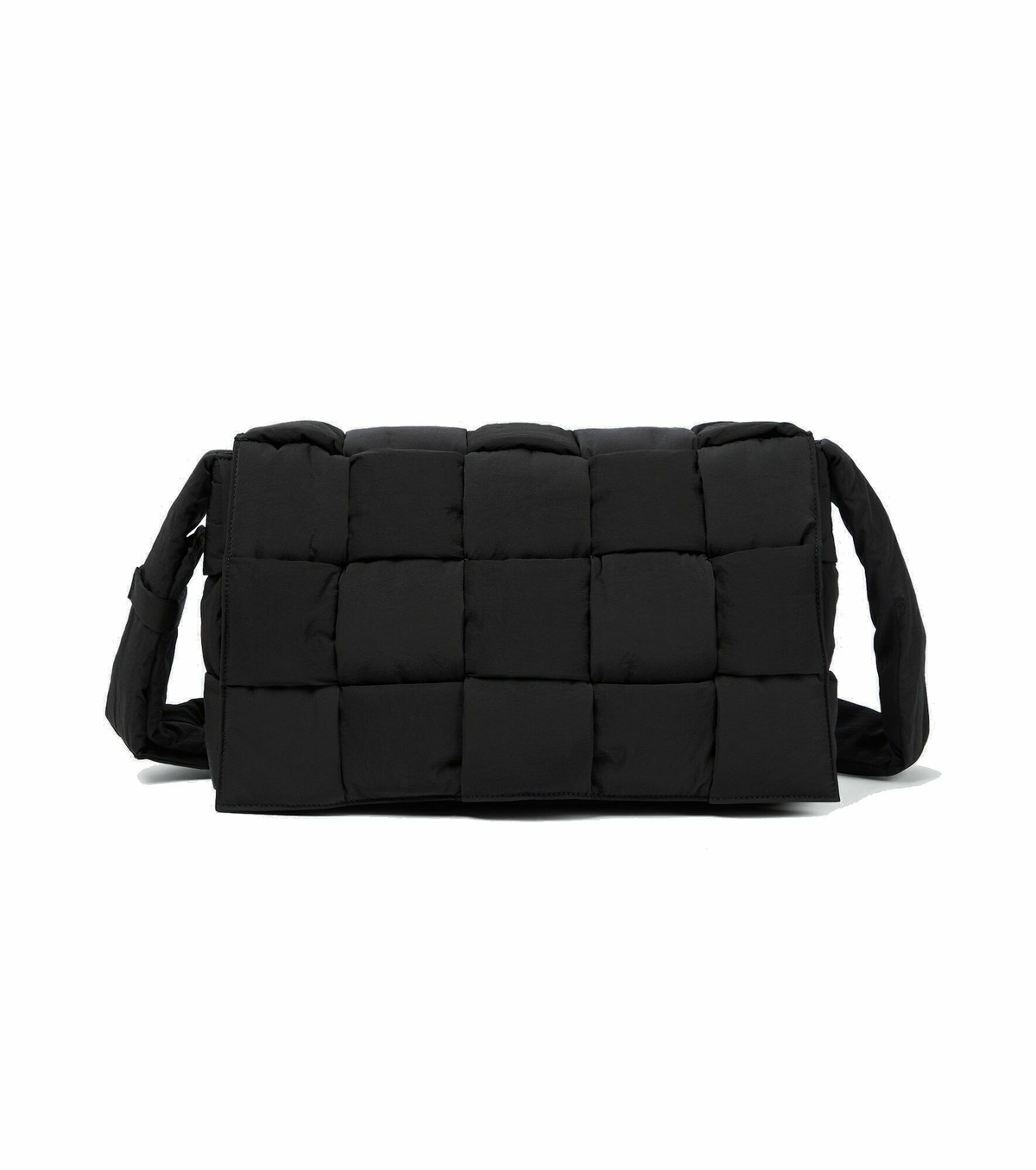 Bottega Veneta® Padded Tech Cassette in Black. Shop online now.