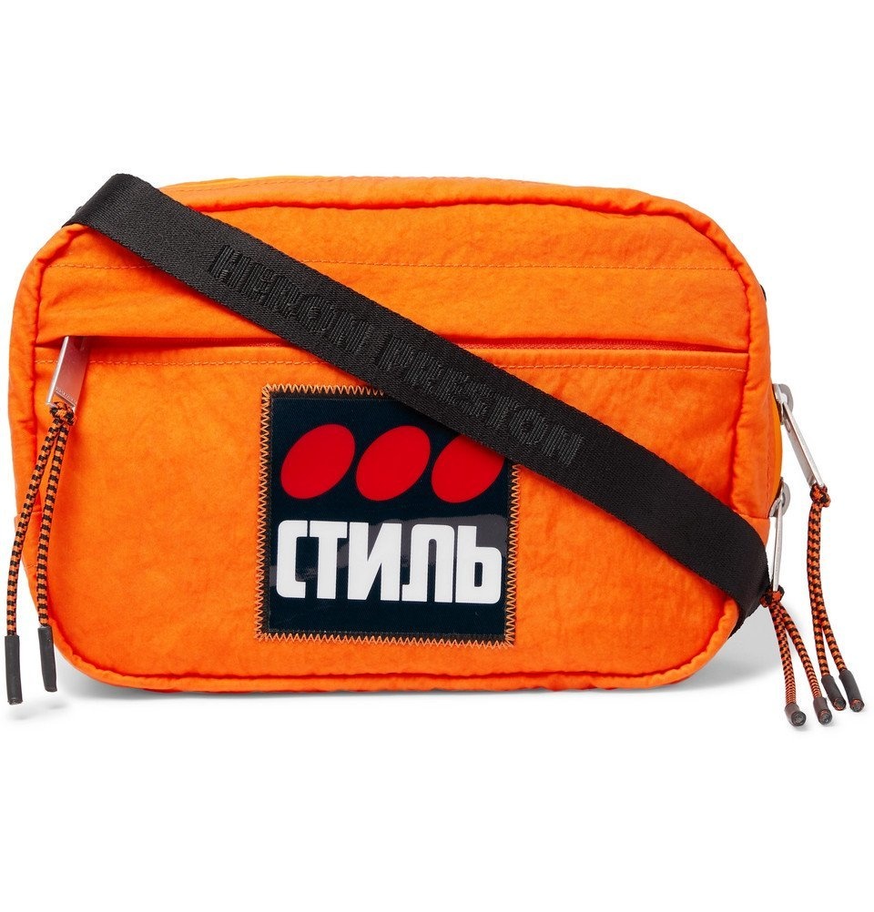 Photo: Heron Preston - Logo-Appliquéd Shell Camera Bag - Orange