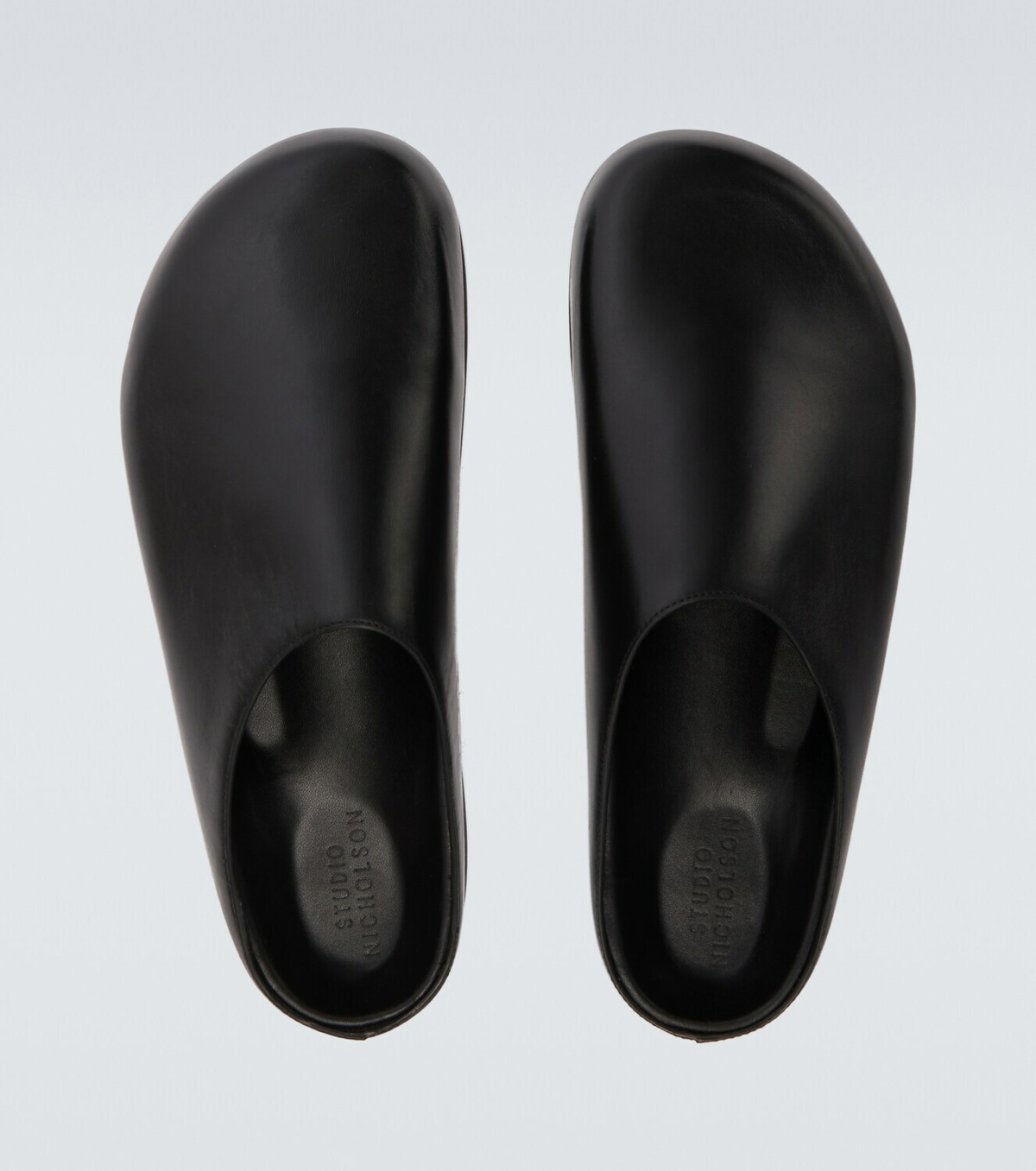 Studio Nicholson Wearing leather mules