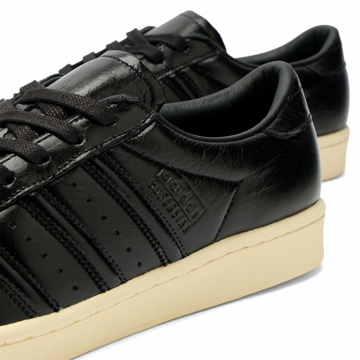 Adidas Superstar Vintage Sneaker in Core Black/Core Black/Warm Vanilla