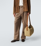 The Row Logan E/W leather-trimmed crossbody bag
