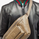 Gucci Men's Embossed GG Leather Waist Bag in Taupe