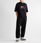 Balenciaga - Wide-Leg Logo-Print Loopback Cotton-Jersey Sweatpants - Black